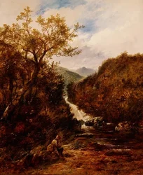 Angler bei einem bewaldeten Wasserfall