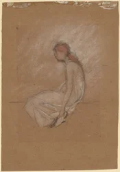 Sitzende Frau mit roten Haaren