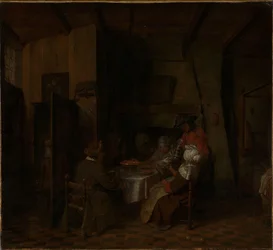 Eine Familienmahlzeit in einer Bauernhütte