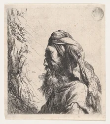 Nach links gewandter Mann mit Turban