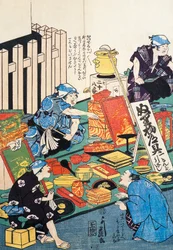 Stand mit Kisten, Fächern, Büchern und Kakemonos