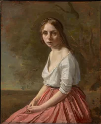 Junge Frau in einem rosa Rock