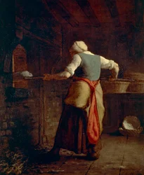 Frau beim Brotbacken