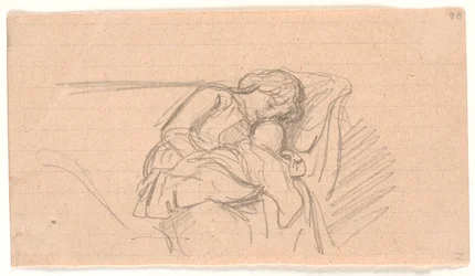 Frau mit Kind auf dem Schoß, sitzend auf dem Sofa