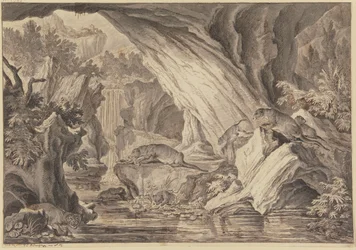 Sechs Fischotter in einer Felsenhöhle am Wasser
