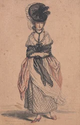 Eine modische Dame mit schwarzem Schal und roten Schuhen
