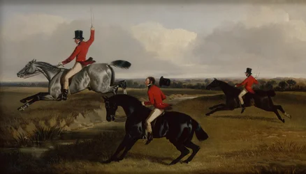 Drei Jäger überqueren einen Bach