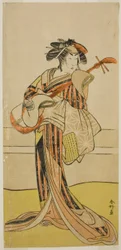 Der Schauspieler Yamashita Mangiku I als Osan im Stück Kitekaeru Nishiki no Wakayaka, aufgeführt im Nakamura Theater im elften Monat, 1780