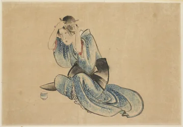 Sitzende Dame bei ihrer Toilette