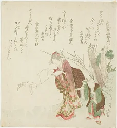 Frau füttert Ziege mit Papier