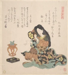 Frau beim Spielen der Tsuzumi