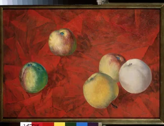 Äpfel auf rotem Hintergrund