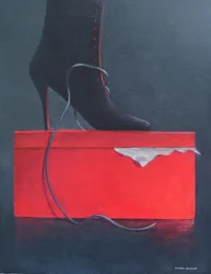 Stiefel auf einer roten Kiste