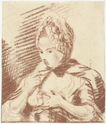 Junge Mutter füttert ihr Kind mit einer Flasche