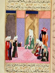 Der Prophet Mohammed, mit bedecktem Gesicht, wahrscheinlich im Gespräch mit seinem Gefährten Omar oder Omar I., genannt Al-Farouq (Al Farouq oder Faruq). Miniatur aus „Siyer-i Nebi“ (Siyer i Nebi), einem epischen Gedicht über das Leben des Propheten