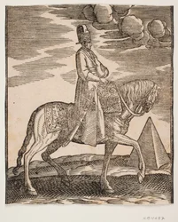 Reiter mit einer Flasche um den Hals, Profil nach rechts; ein Schwert an seiner rechten Seite und Gepäck vor ihm, über den Sattel drapiert; rechts im Hintergrund eine Pyramide