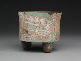 Zylindrisches Dreibeingefäß mit zwei Figuren mit Schutzbrillen, ca. 400-650 n. Chr.