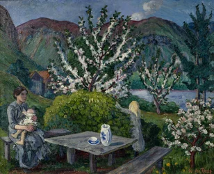 Mutter und Kind am Gartentisch