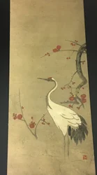 Roter Pflaumenzweig und ein Kranich