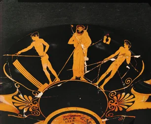 Athleten und ihr Trainer bereiten sich auf den Speerwurf vor