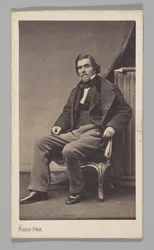 [Atelierporträt: Eugène Delacroix auf einem Stuhl sitzend]