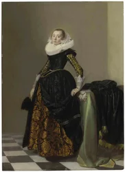 Porträt einer reich gekleideten jungen Dame, ganzfigurig, vor einem drapierten Tisch