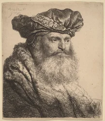 Bärtiger Mann in einer Samtkappe mit Juwelenverschluss