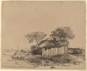 Cottage mit einem weißen Zaun