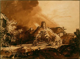 Häuser unter gewittrigem Himmel