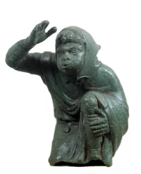 Römische Kunst: bronzene Statuette eines knienden und blasenden Schwarzen Sklaven. 2. oder 3. Jahrhundert n. Chr. Paris, Louvre