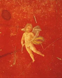 Cherub auf rotem pompejanischen Hintergrund, Fresko im vierten pompejanischen Stil, aus dem Haus des Pinario Ceriale, Pompeji, Kampanien, römische Zivilisation