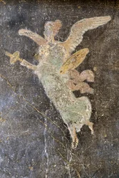 Fresko mit geflügelter Figur, rechter Flügel im Haus der Vettii, Pompeji (UNESCO-Welterbeliste)