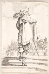 Mann von hinten gesehen, der eine Treppe mit drei Stufen hinaufgeht