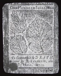 Eine 100-Schilling-Note, entworfen und gedruckt von Benjamin Franklin im Jahr 1759