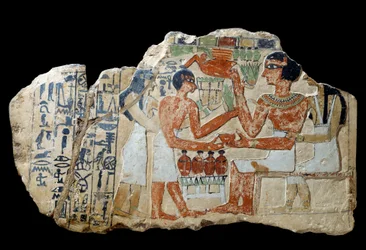 Ägyptische Antiquität: Iri-Stele aus Kalkstein. Ein Paar bringt ein Opfer dar. Erste Zwischenzeit (2200-2033 v. Chr.). Paris, Louvre