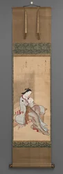 Sitzende Frau mit Fächer