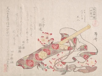 Shakuhachi, eine Art Bambusflöte, mit Hülle und Kirschblüten