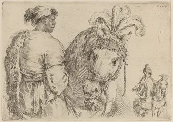 Ein Schwarzer Mann, der ein Pferd füttert