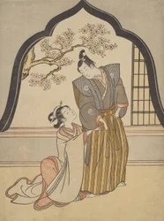 Liebende, die sich neben einem Fenster anziehen