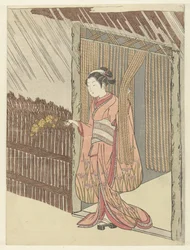 Mädchen mit einem Yamabuki-Zweig in den Händen