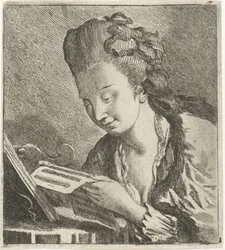 Junge Frau liest Noten