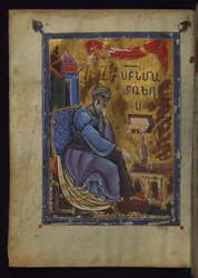 Evangelist Matthäus sitzt und taucht den Stift in das Tintenfass
