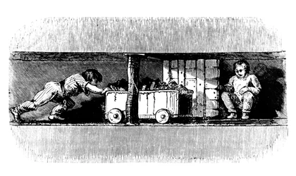 Junge schiebt einen mit Kohle beladenen Wagen vom Kohleflöz zum Schachtboden (ca. 1848)