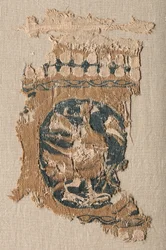 Fragment eines Wandbehangs mit Rundel und Bordüre, 800er-900er