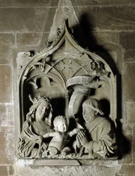 Gotische Kunst: Epitaph eines Kanonikers, Steinskulptur von Nicolas de Leiden. 1463, Kathedrale Notre Dame, Straßburg (Bas-Rhin)