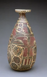 Korinthischer schwarzfiguriger Alabastron, mit einer geflügelten 