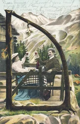 D: Ein Mann und eine Frau sitzen an einem Tisch vor einem Berghütte und stoßen mit einem Glas Wein an - Alphabet Figuren Ref Th. E., L. Theochrom - Serie 994. Theodor Eisman, Verleger, Leipzig