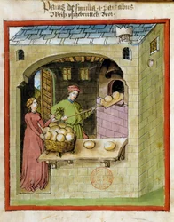 Brotbacken: ein Bäcker backt die Brote. Illumination aus dem Manuskript „Tacuinum sanitatis“