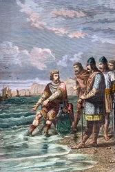 Knut der Große überzeugt seine Höflinge davon, dass er nicht die Macht besitzt, die Flut aufzuhalten - König Knut II. der Große (Knud I. der Große) (um 995-1035), König von England ab 1016, von Dänemark ab 1018 und von Norwegen ab 1030 - Er zeigt seinen