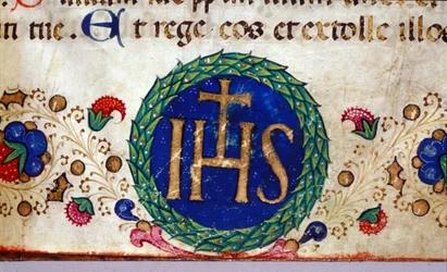IHS Christliches Symbol, dessen Bedeutung Jesus ist. Manuskript aus dem 15. Jahrhundert